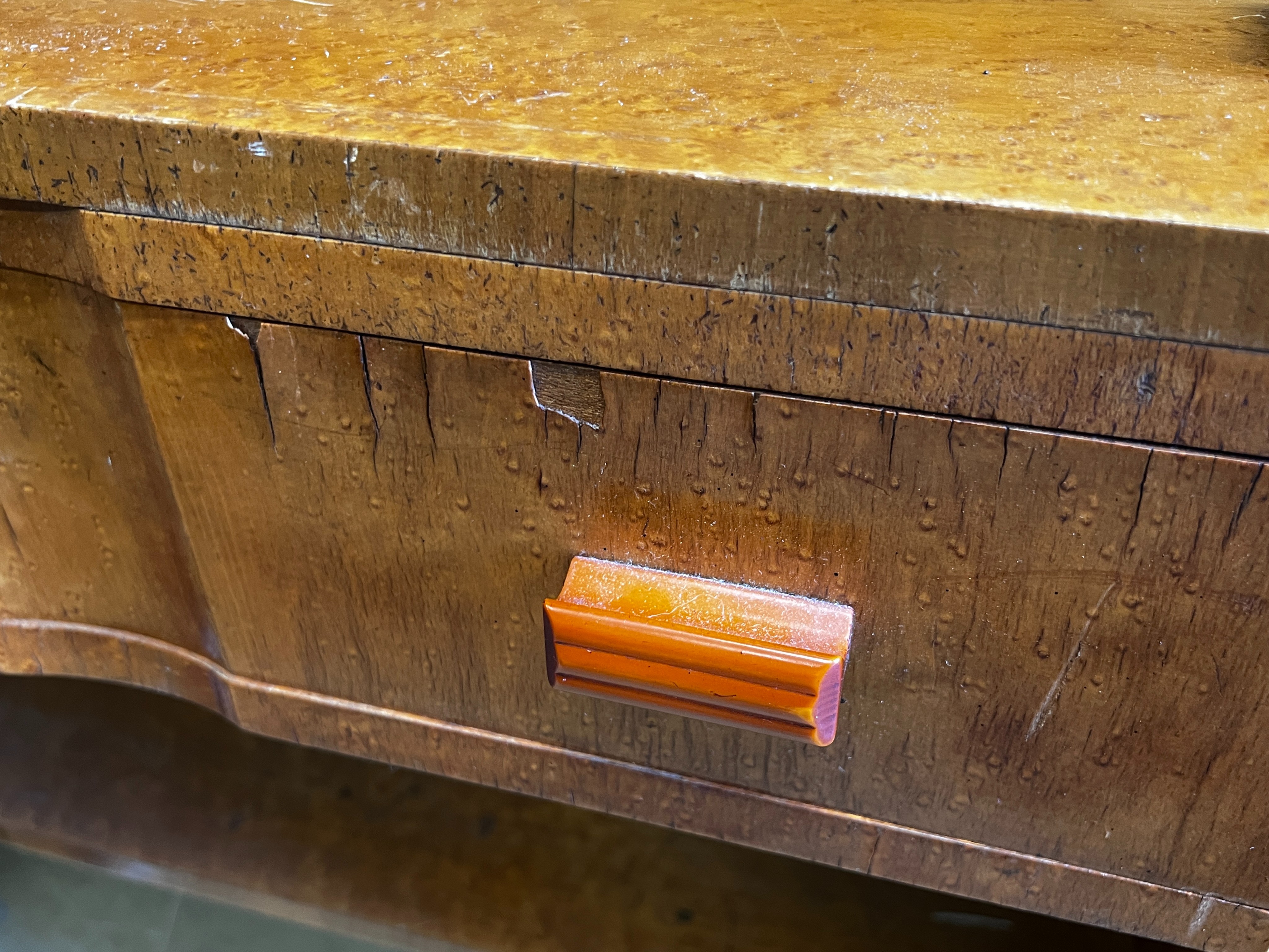 An Art Deco birds eye maple side cabinet.